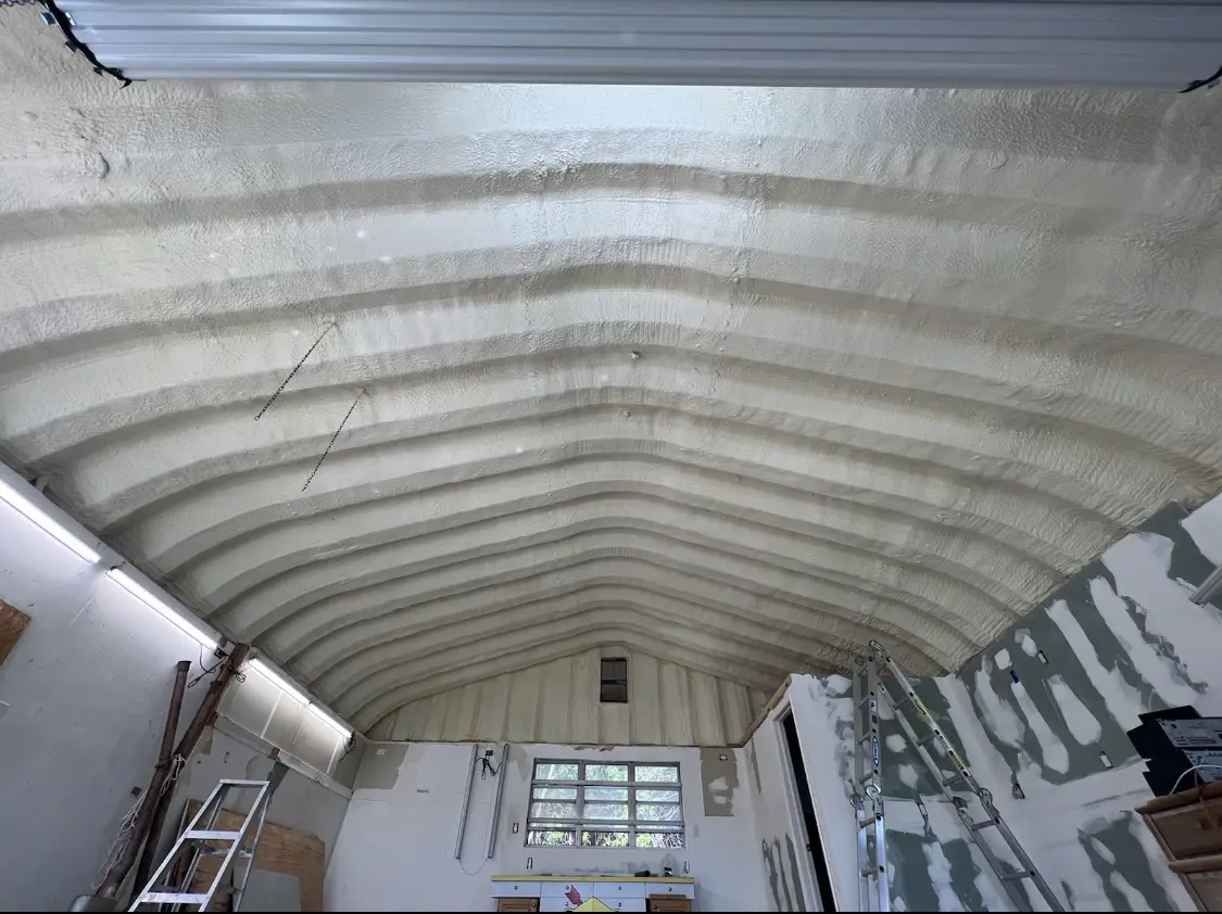 Spray polyurethane foam applied to the underside of a metal roof deck in New Orleans